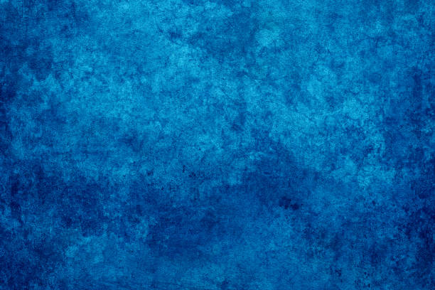 istock Close-Up of a Weathered Blue Wall with Distressed Textures, Stains, and a Rustic Grunge Aesthetic 2185955554