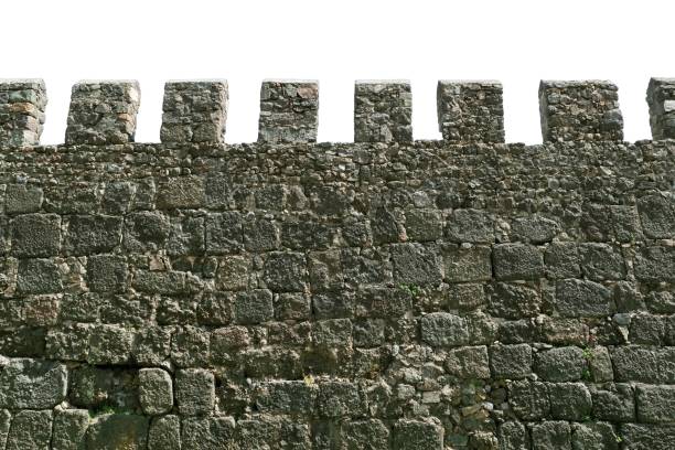 Stone wall of an ancient fortress isolated on white background. Sights