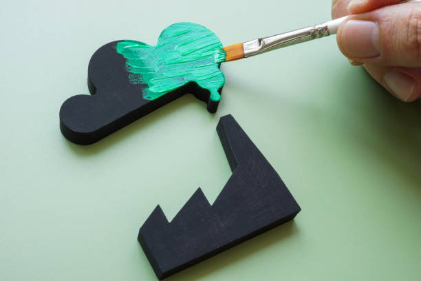 istock Changing factory smoke from black to green. Environmental improvement. 2185969932