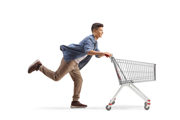 istock Young man running with a shopping cart 2185976807
