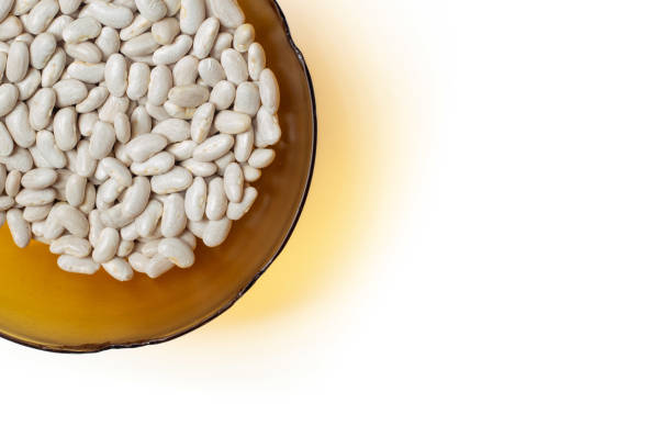 Portion of white beans in an old, chipped bowl from home