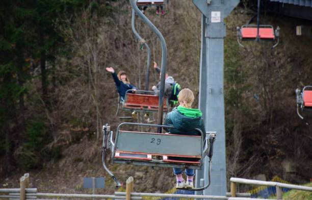 A group of tourists on a ski lift in Bukovel. This is a popular ski resort in Ukraine