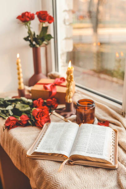 istock Open Bible in a cozy home interior. Good morning. 2185989165