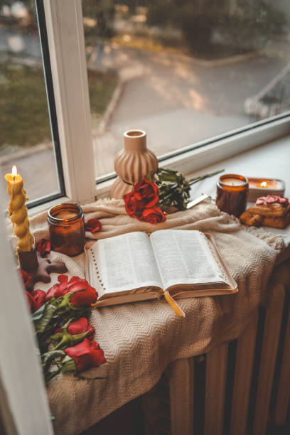 istock Open Bible in a cozy home interior. Good morning. 2185989169
