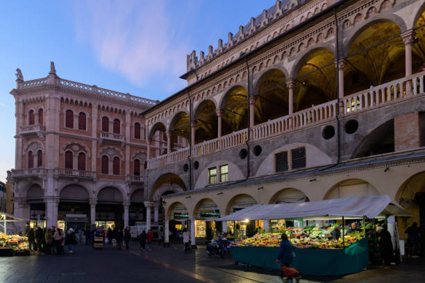 Padua, Italy - January 29th 2024: Palazzo della Ragione in seen From Piazza delle Erbe, a medieval market and town hall and palace of justice. Padova
