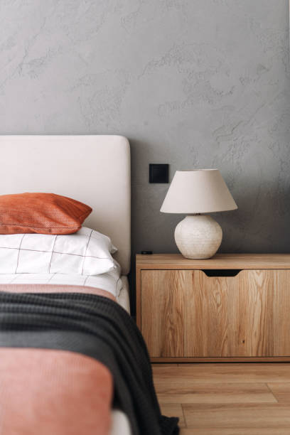 istock Modern bedroom with minimalist design featuring neutral tones and cozy elements 2185993751