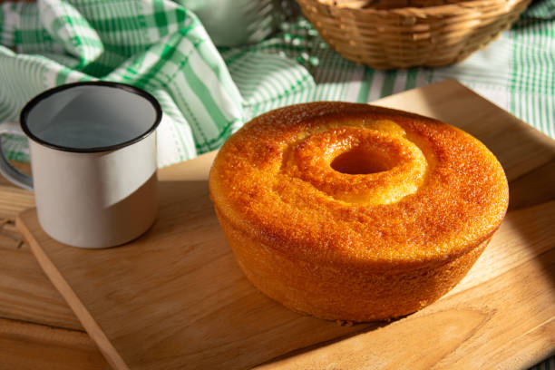 istock Orange cake, a beautiful sunny breakfast table and delicious Orange cake, selective focus. 2185995254