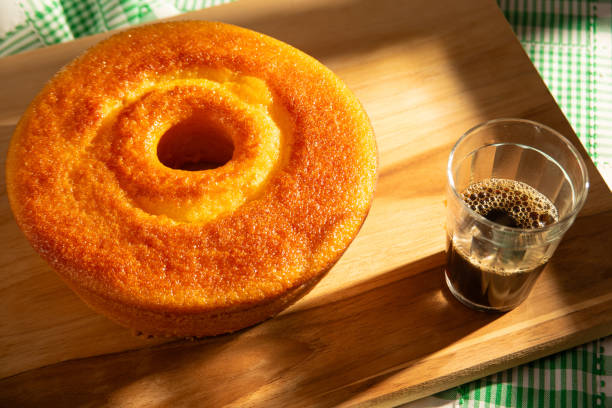 istock Orange cake, a beautiful sunny breakfast table and delicious Orange cake, selective focus. 2185995354