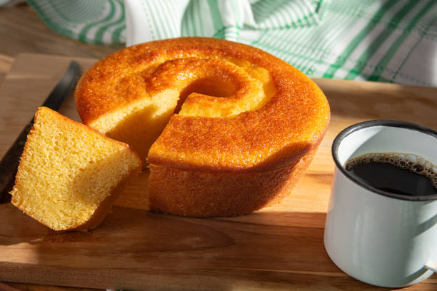 istock Orange cake, a beautiful sunny breakfast table and delicious Orange cake, selective focus. 2185996145