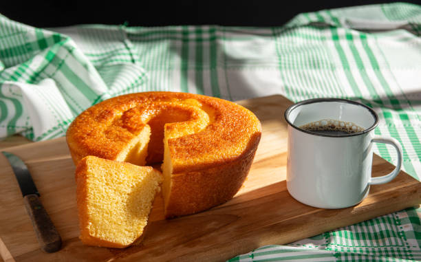 istock Orange cake, a beautiful sunny breakfast table and delicious Orange cake, selective focus. 2185996161