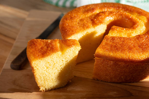 istock Orange cake, a beautiful sunny breakfast table and delicious Orange cake, selective focus. 2185996300