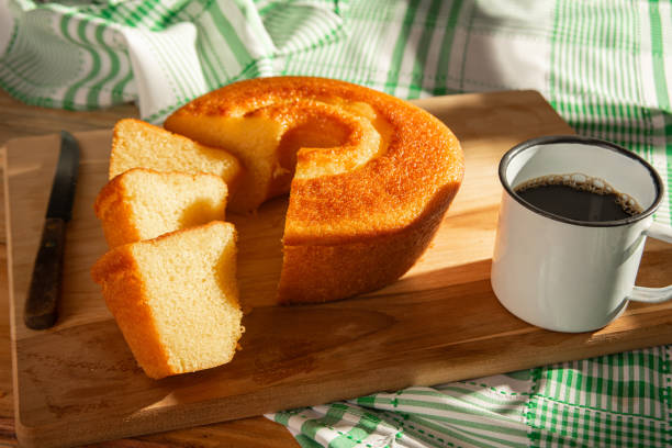 istock Orange cake, a beautiful sunny breakfast table and delicious Orange cake, selective focus. 2185996322