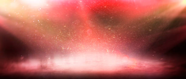 istock Red abstract background. Beautiful empty background with lights. Stage podium with red smoke, golden spotlight and glitter on dark background. Red background 2186003341
