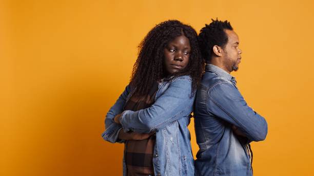 istock Distant sad husband and wife regret fighting each other in studio 2186019548