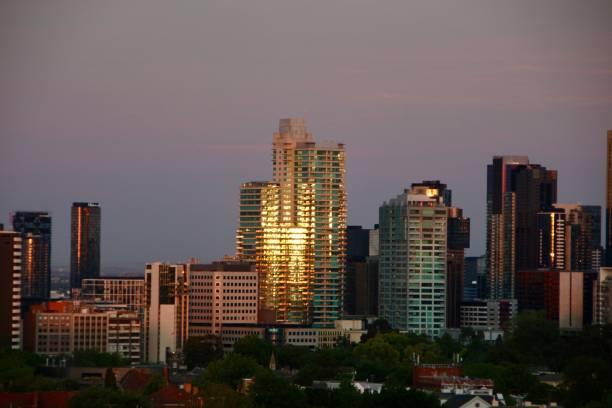 istock Sun making the glazing glow on a building facade 2186021509