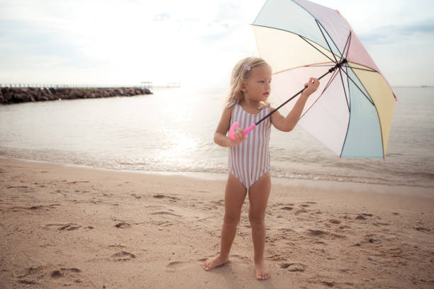 Children relaxing on the beach