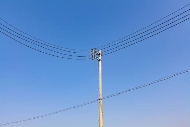 istock electric poles and wires 2186044139
