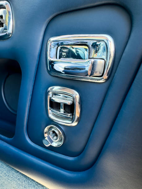 Interior detail of window switches from a classic car.