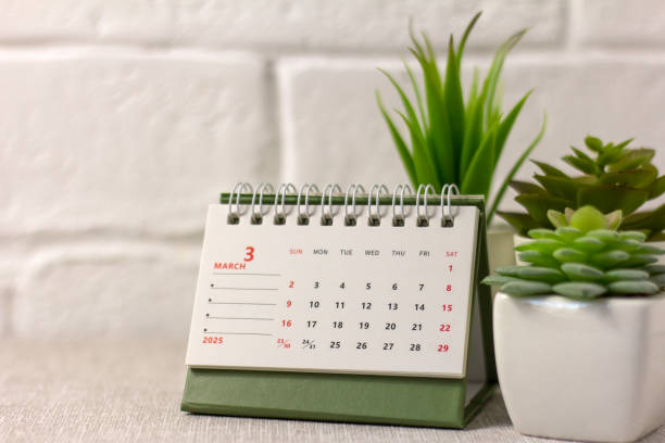 istock March 2025 on the table. Desk calendar for planning and organizing time. 2186067600