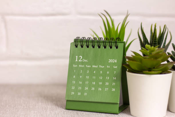 istock Hello December 2024. Desk calendar for planning and organizing time. 2186067605