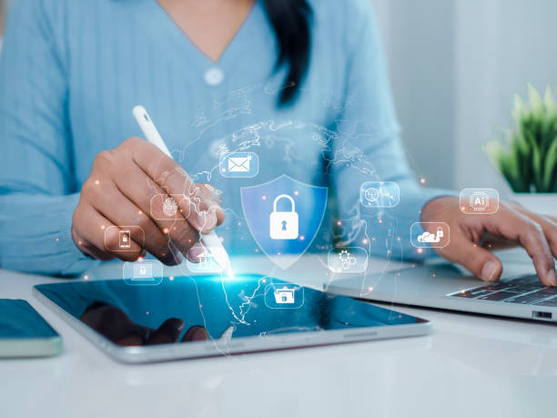 istock Businesswoman showing key and network security represents protection against cyber attacks and online hacking, Protection against external hacks, Cybersecurity and privacy concepts to protect data. 2186074709