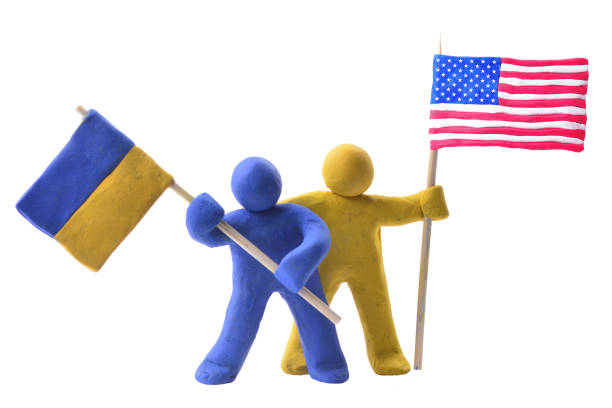 istock American and Ukrainian flag on a white isolated background 2186088708
