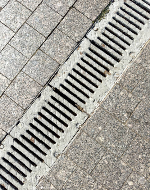 istock A drain pipe is shown in a grey and white color 2186091469