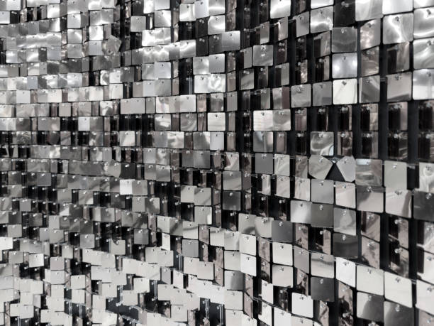 istock A wall of shiny silver tiles with a pattern of squares 2186091533