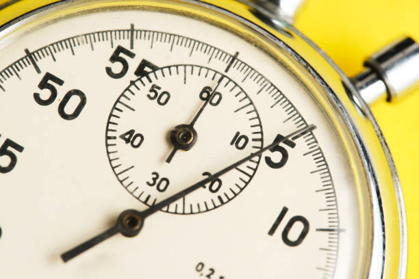 istock Mechanical stopwatch yellow background closeup. 2186093032