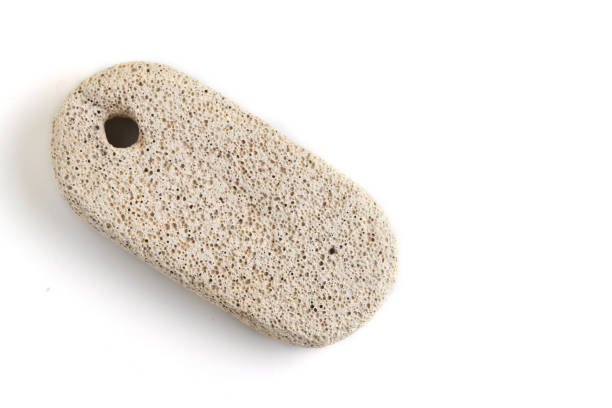 Pumice stone for cleaning feet and heels, on white background