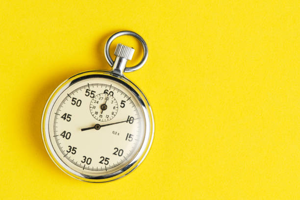 istock Mechanical stopwatch yellow background closeup. 2186093066