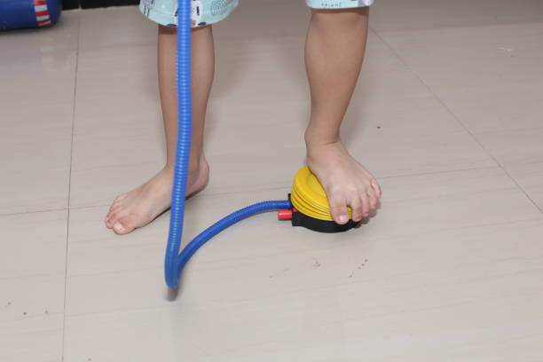 istock close-up of a boy's legs pumping with a step pump 2186102517