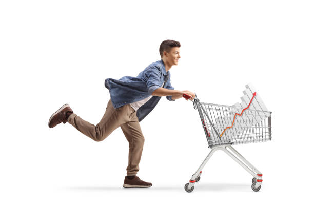 istock Guy running with a shopping cart with a bar chart inside 2186106626