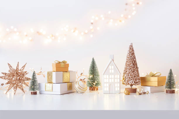 istock White Christmas table with various winter holiday symbols and decoration objects 2186109410