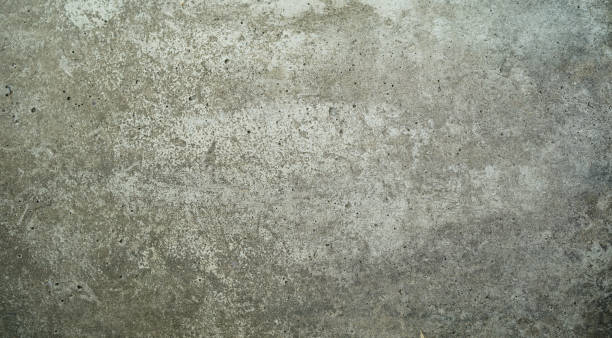 istock Empty old gray cement grunge wall with many small hole, abstract concrete texture background, grunge wall texture with scratches patterns, copy space for work, banner, wallpaper for design. 2186128154
