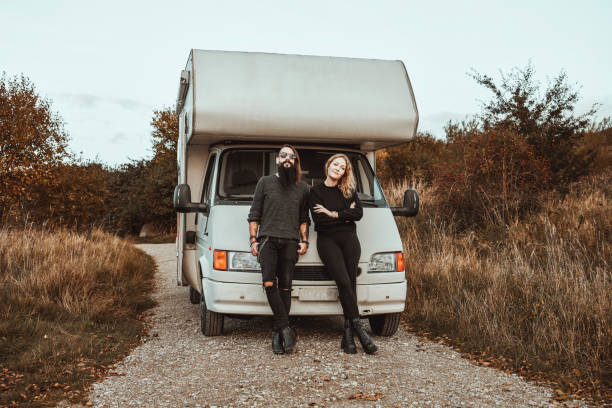 istock Mixed ethnical race couple on the road with mobile home 2186128458