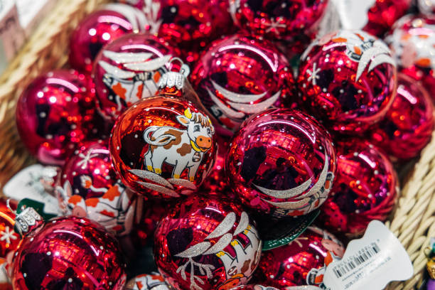 istock Christmas tree decorations on a store counter close-up 2186131375