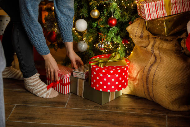 istock Woman prepairing Christmas presents 2186147833