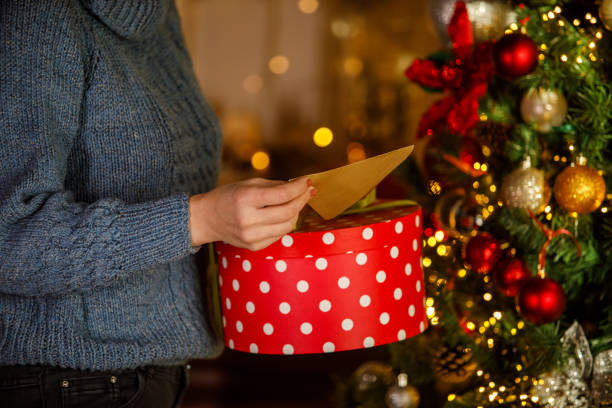 istock Woman prepairing Christmas presents 2186147834