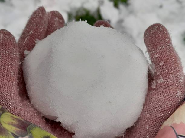 istock Snowball in child's hand 2186151023