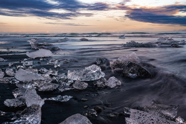 istock Diamond Beach, Iceland, a black sand beach with iceberg fragments 2186152963