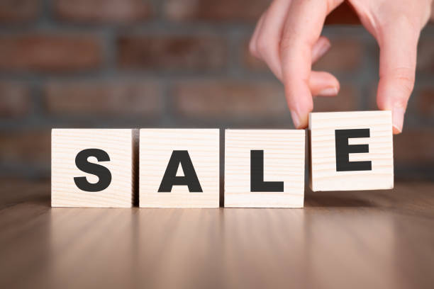 istock Sale word with wooden blocks on table 2186169746