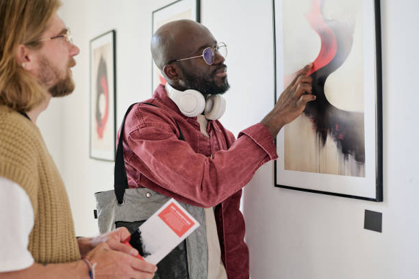 istock Observing Artworks at Contemporary Art Gallery Exhibit 2186179622