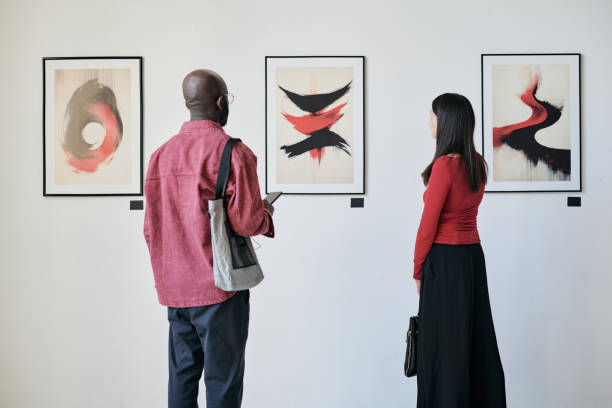 istock Observing Artwork in Modern Art Gallery Exhibit 2186179724