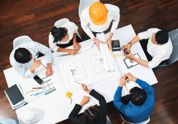 istock Diverse group of civil engineer and client working on architect. Prudent 2186180053