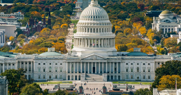 istock US Capitol Building Surrounded by Autumnal Foliage - Aerial 2186186563