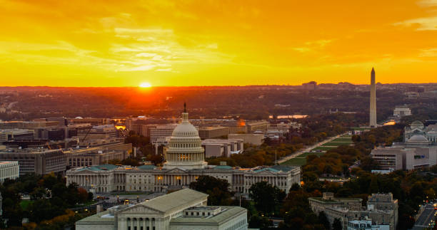 istock Sun Setting Behind US Capitol Building and Washington Monument - Aerial 2186186957