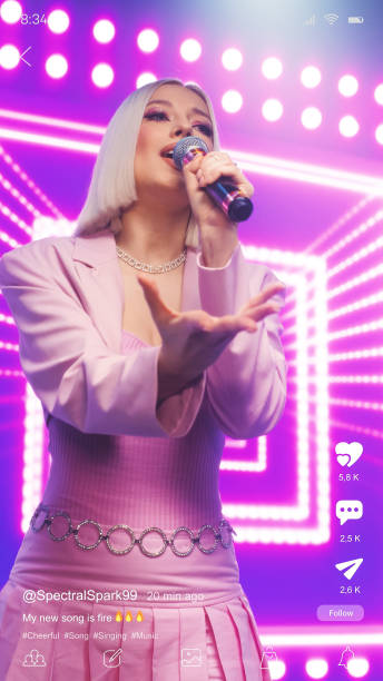 Vertical Mobile Interface: Social Media Mockup App With a Beautiful Female Singer Dressed In Gorgeous Outfit Performing Her Hit Song During Concert. Ideal Template for Social Media Posts and Stories.