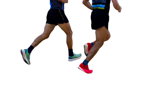 istock two male athletes running marathon isolated on white background 2186201548