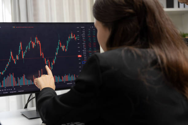 istock Business traders discussing on dynamic stock risk or profit point. Postulate. 2186203261